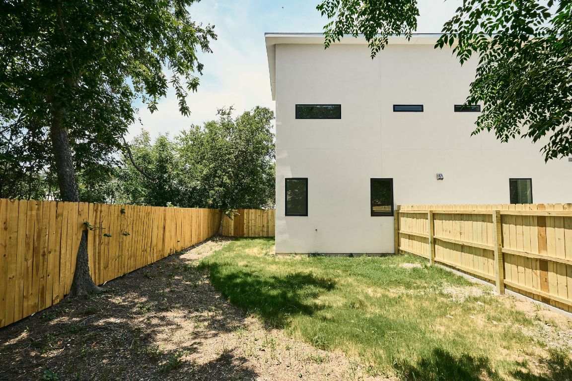 2609 Davis Lane, Unit 2 Austin, TX 78748 - Photo 22 of 23 a view of backyard with wooden fence