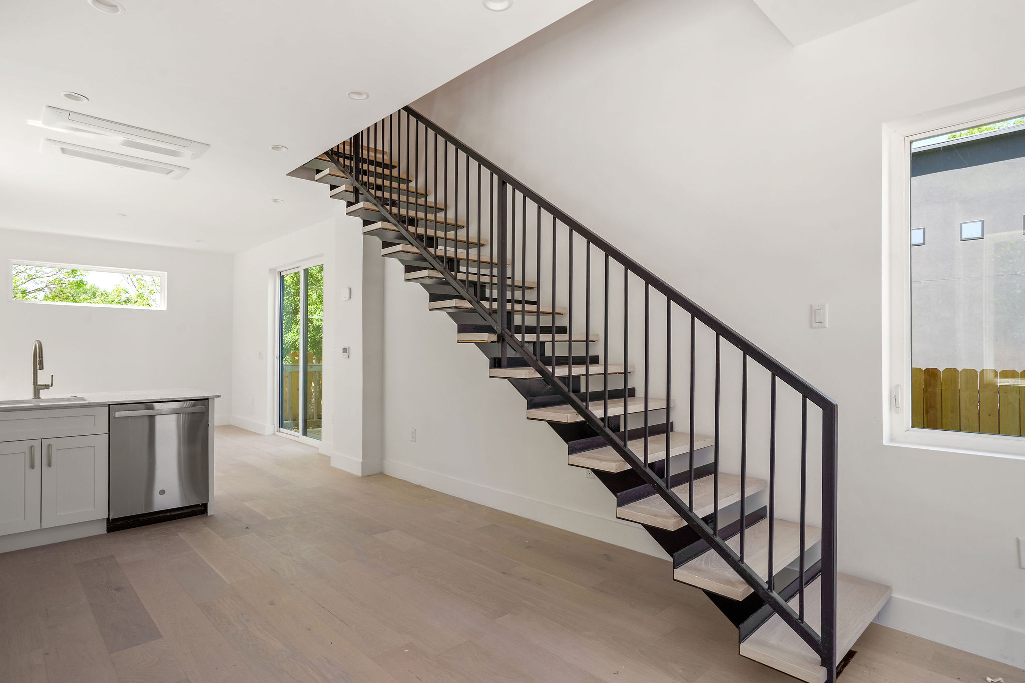 2609 Davis Lane, Unit 2 Austin, TX 78748 - Photo 6 of 23 a view of a hallway with entryway and stairs