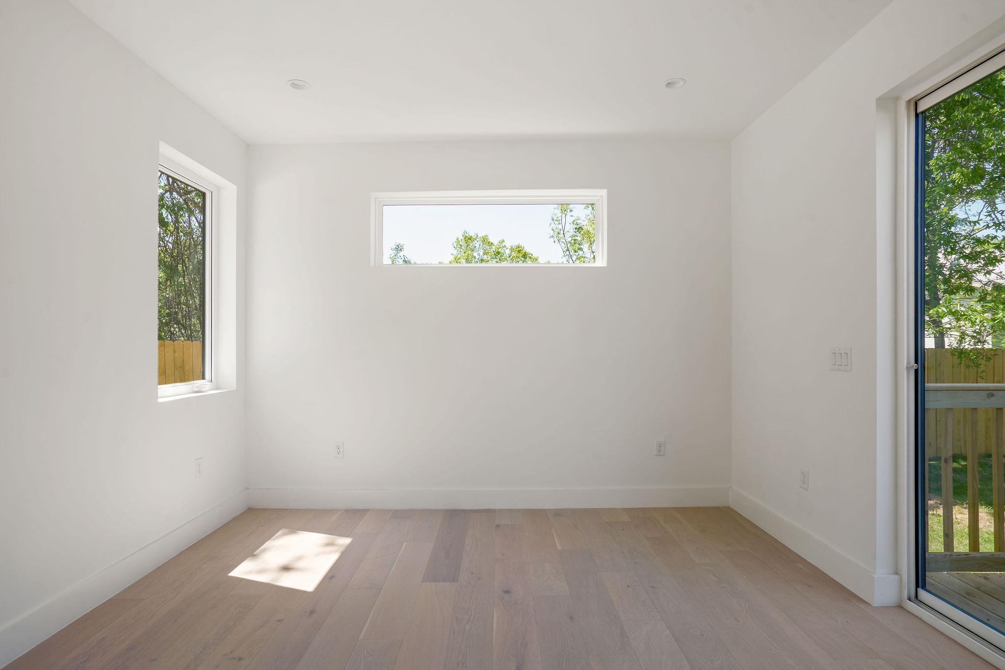 2609 Davis Lane, Unit 2 Austin, TX 78748 - Photo 10 of 23 an empty room with windows