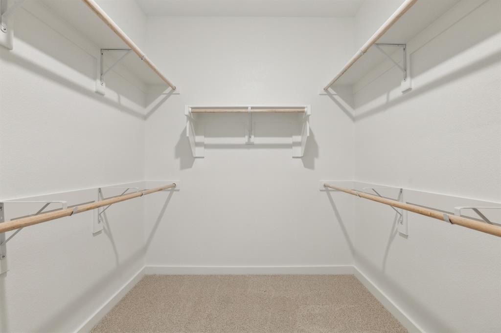 676 Poppy Lane Lavon, TX 75166 - Photo 25 of 35 Primary Closet in the Masters home plan by Trophy Signature Homes – REPRESENTATIVE PHOTO