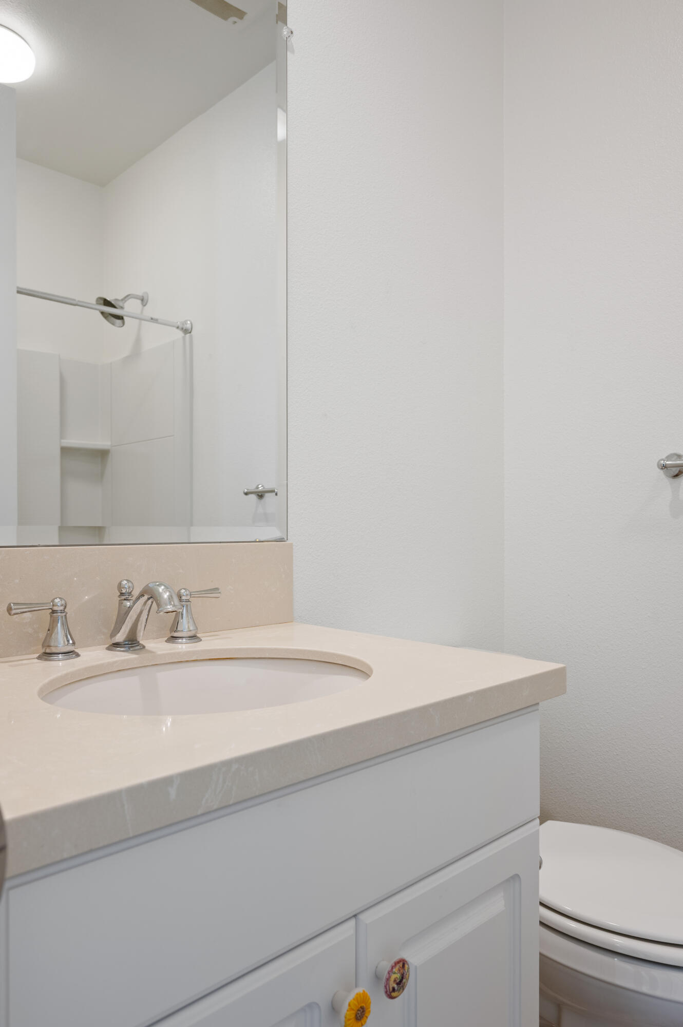 246 Robles Way Buellton, CA 93427 - Photo 15 of 26 a bathroom with a sink a toilet and a mirror
