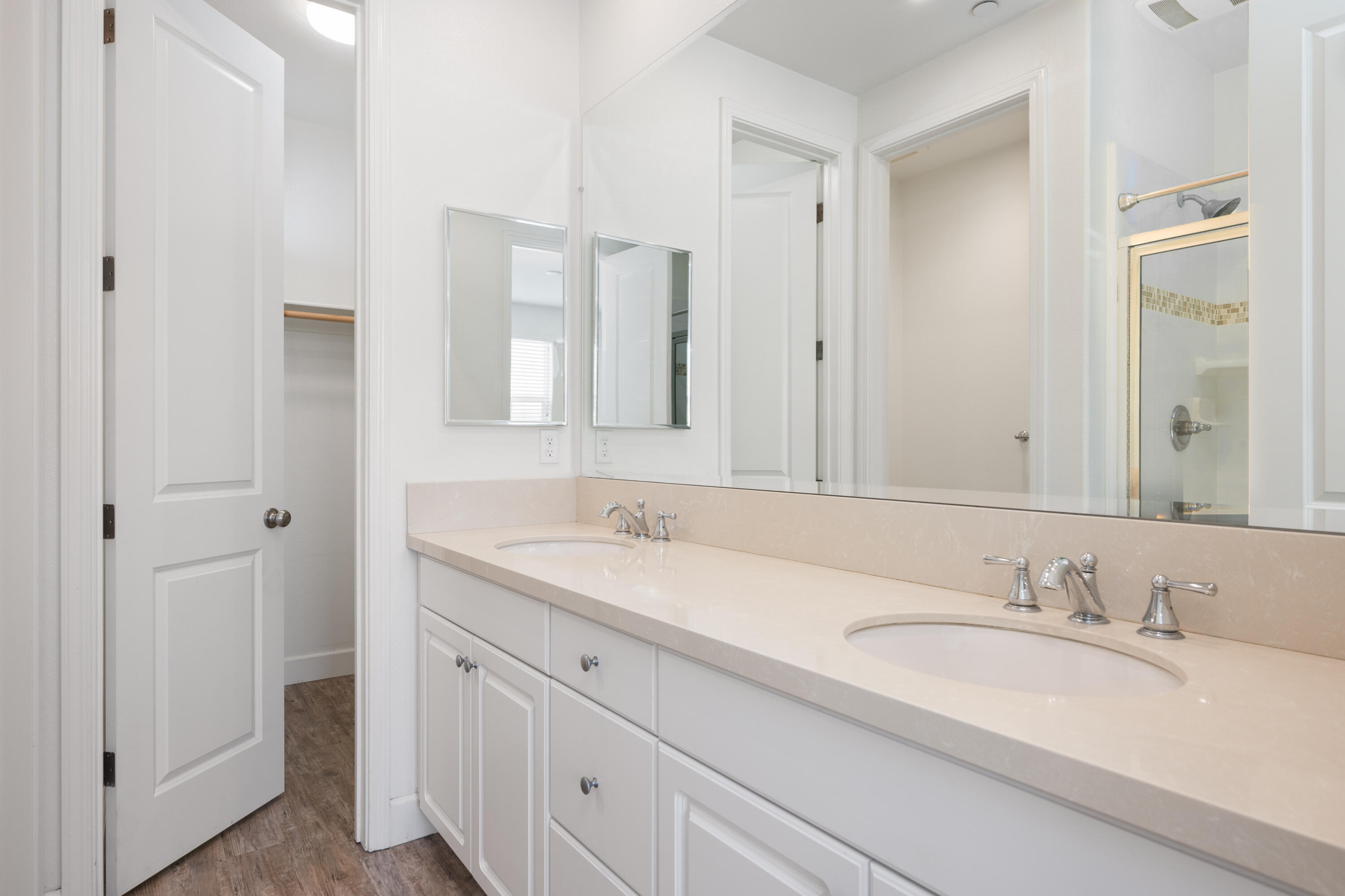 246 Robles Way Buellton, CA 93427 - Photo 18 of 26 a bathroom with double sink and a mirror