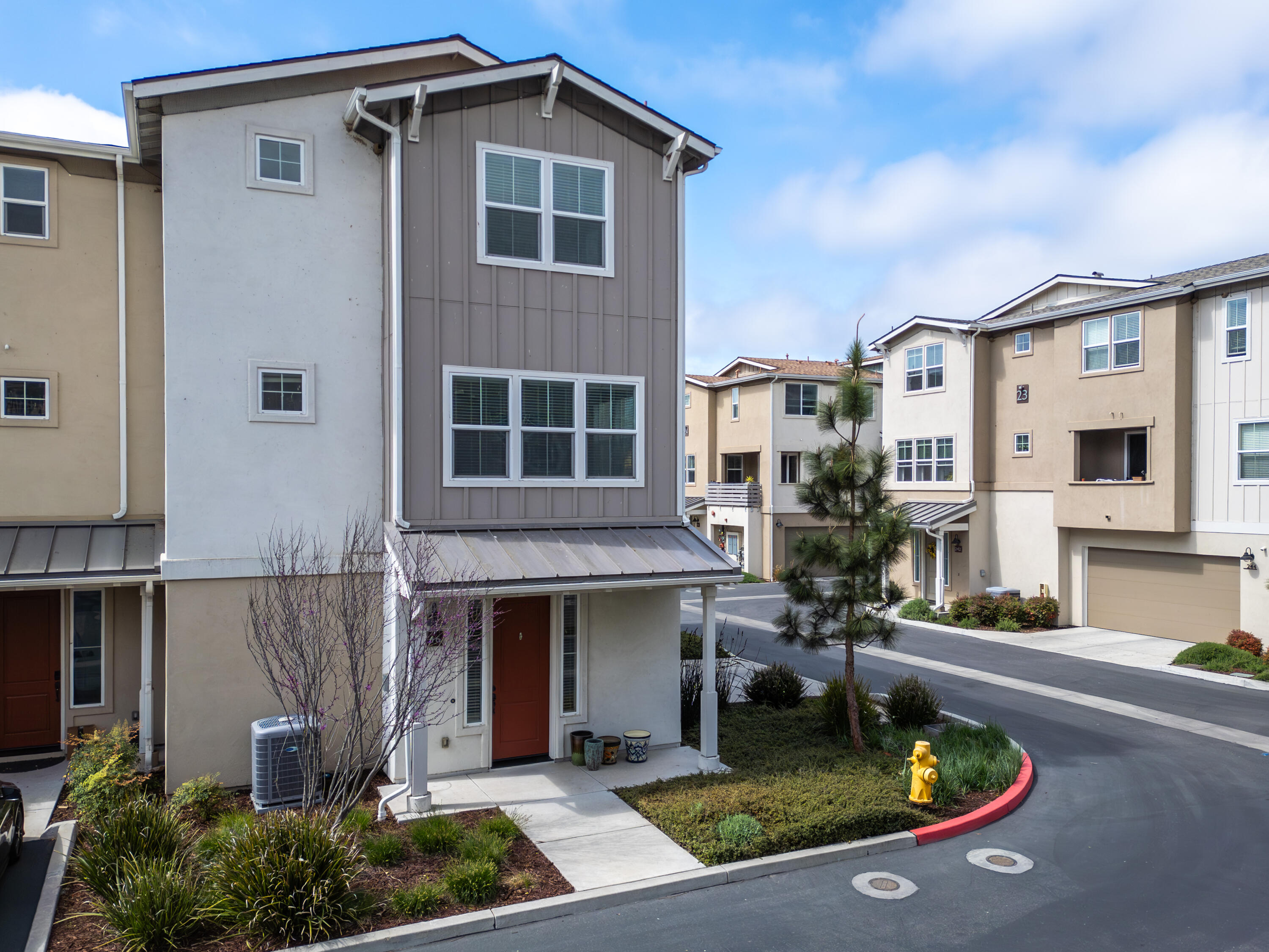 246 Robles Way Buellton, CA 93427 - Photo 2 of 26 a front view of a house with garden