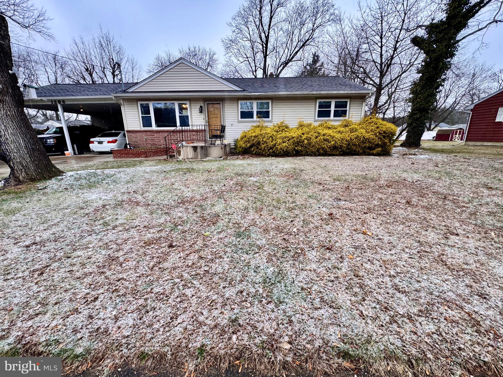 1286 Harding Road Vineland, NJ 08361 - Photo 15 of 40 a front view of a house with garden