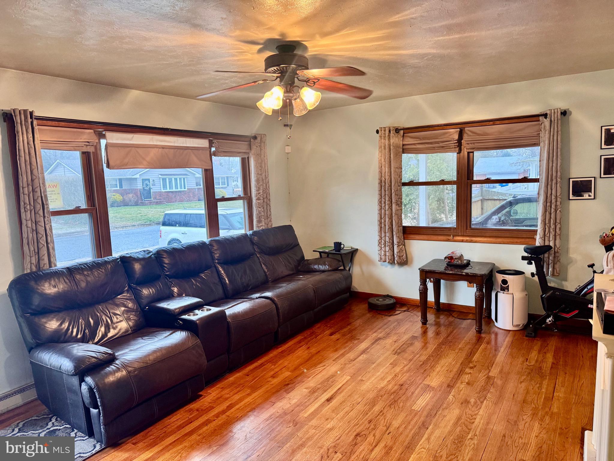 1286 Harding Road Vineland, NJ 08361 - Photo 33 of 40 a living room with furniture and a wooden floor