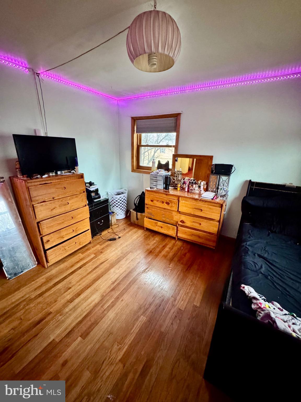 1286 Harding Road Vineland, NJ 08361 - Photo 36 of 40 a bedroom with furniture and a lamp