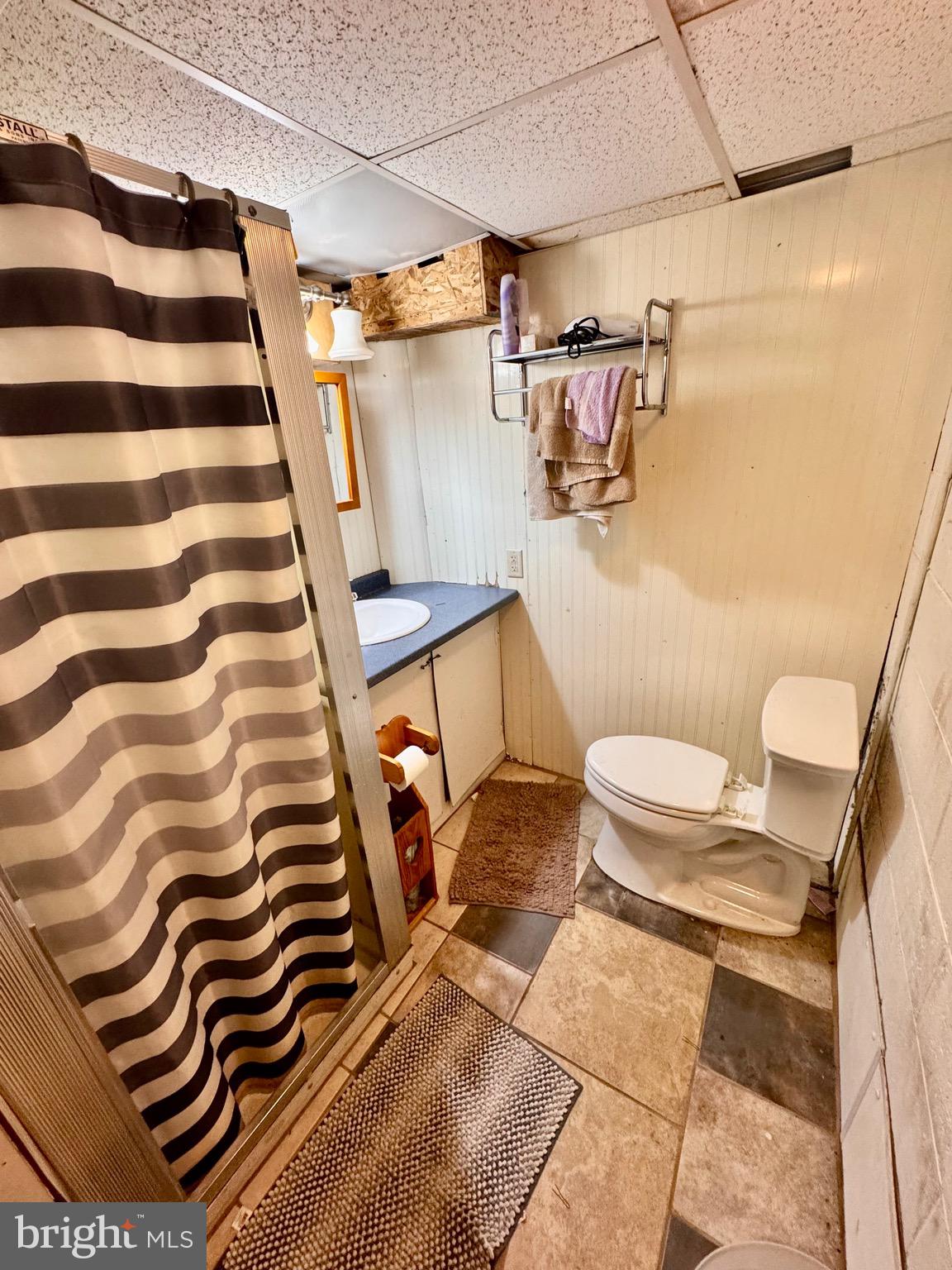 1286 Harding Road Vineland, NJ 08361 - Photo 40 of 40 a bathroom with a sink and toilet