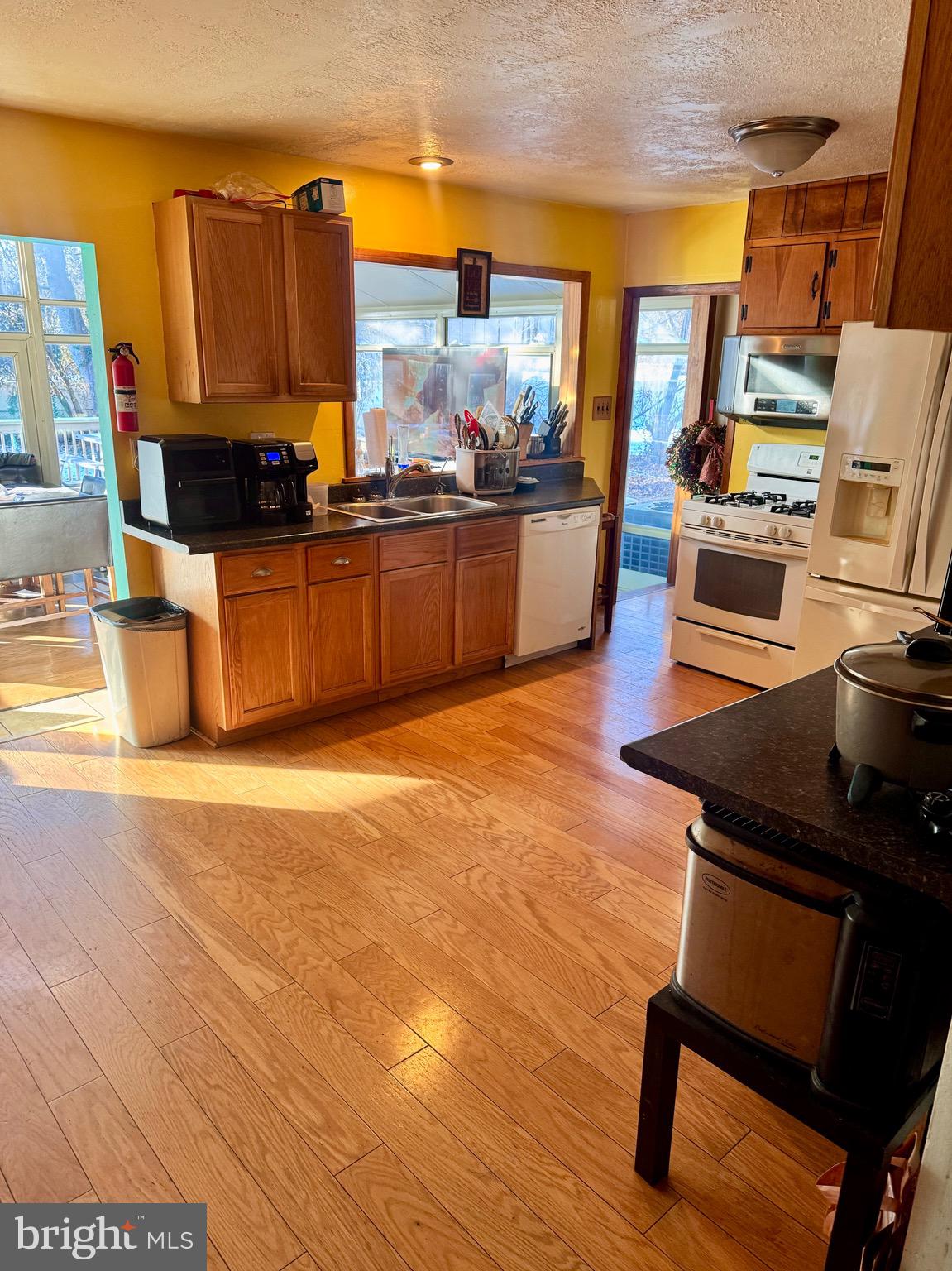 1286 Harding Road Vineland, NJ 08361 - Photo 7 of 40 a kitchen with a sink and wooden cabinets