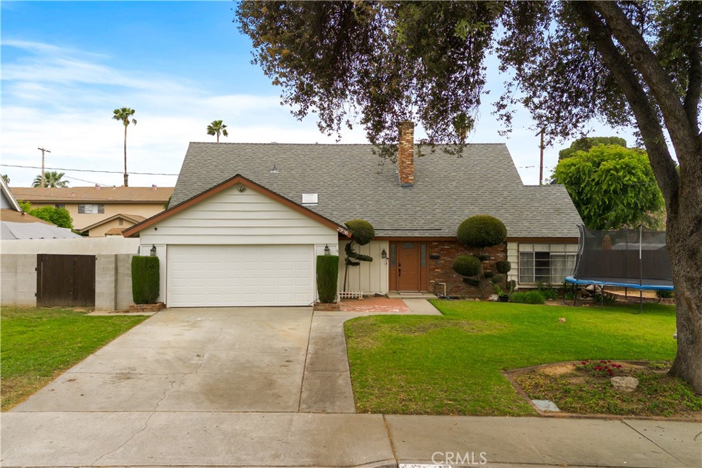 2956 Bautista Street Riverside, CA 92506 - Photo 1 of 1 a front view of a house with garden