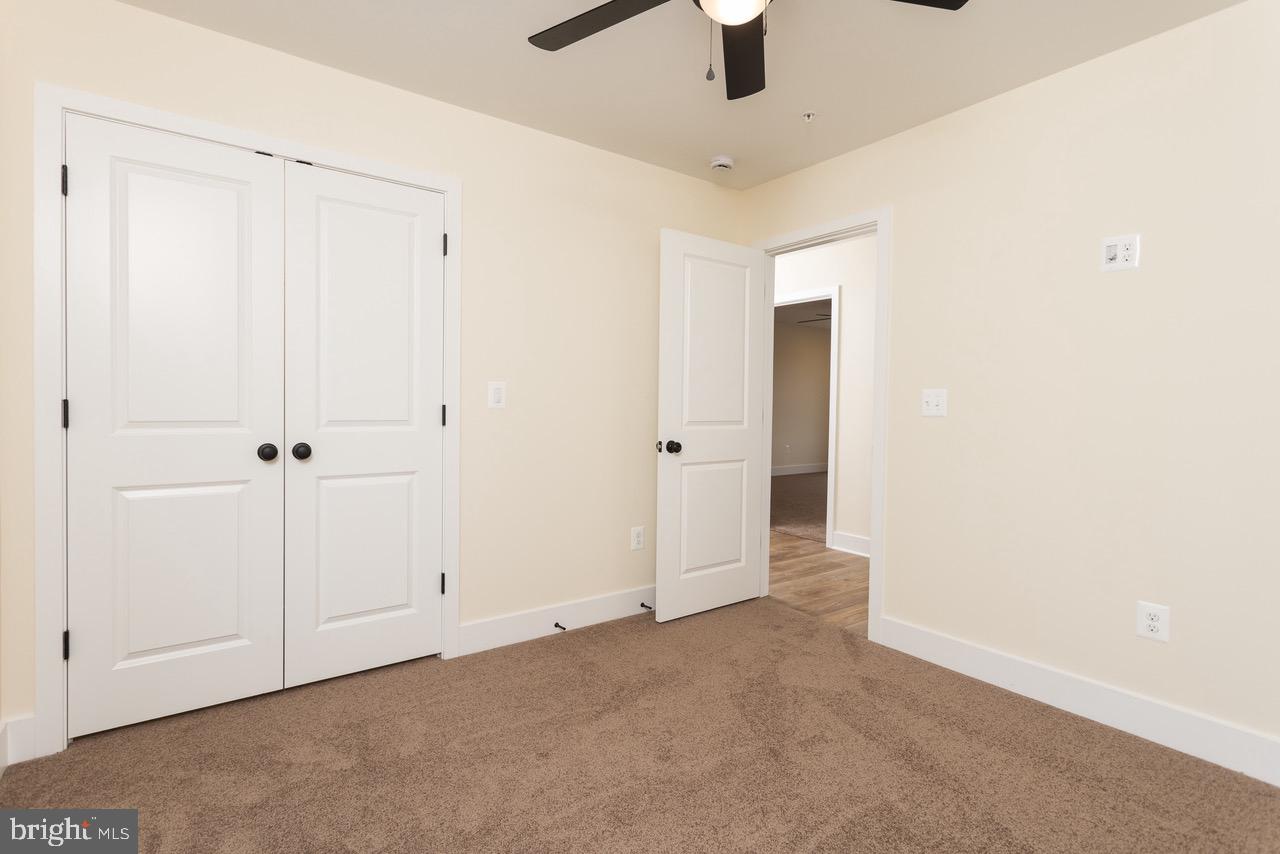 2905 Sparrows Point Road Sparrows Point, MD 21219 - Photo 18 of 32 an empty room with fan