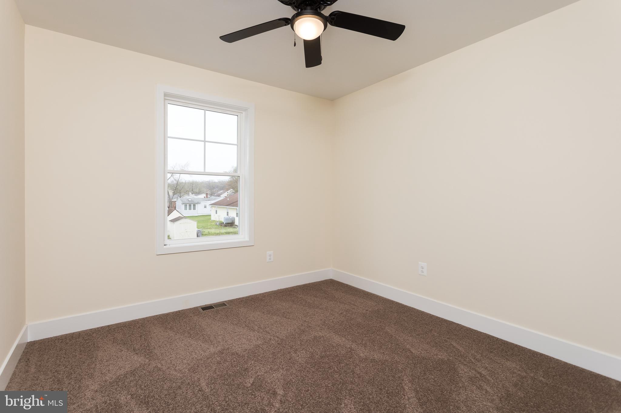 2905 Sparrows Point Road Sparrows Point, MD 21219 - Photo 19 of 32 an empty room with a window