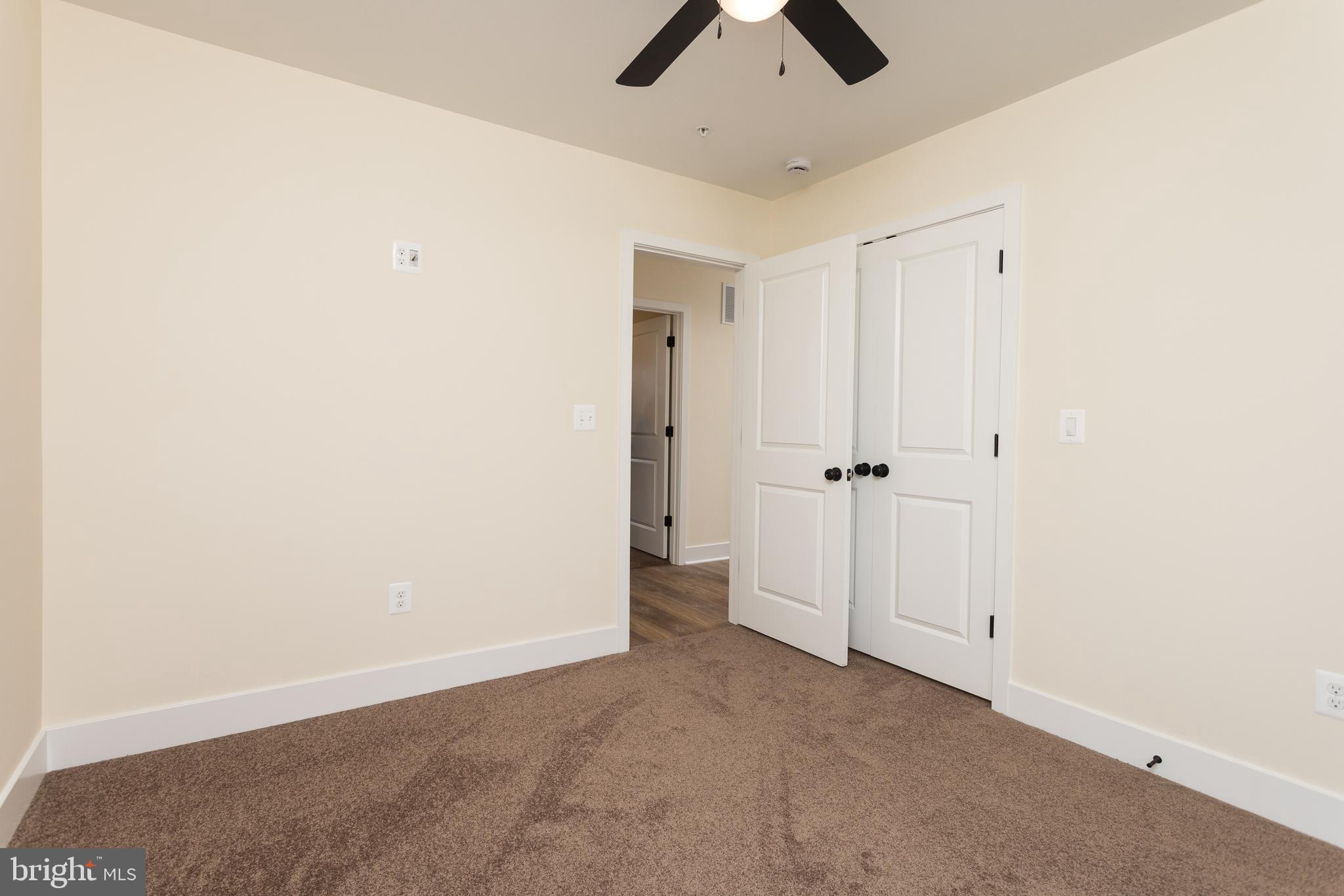 2905 Sparrows Point Road Sparrows Point, MD 21219 - Photo 20 of 32 an empty room with chandelier fan