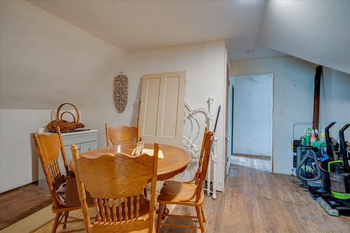 7480 Beech Hill Road Pulaski, TN 38478 - Photo 22 of 54 a dining room with furniture and wooden floor