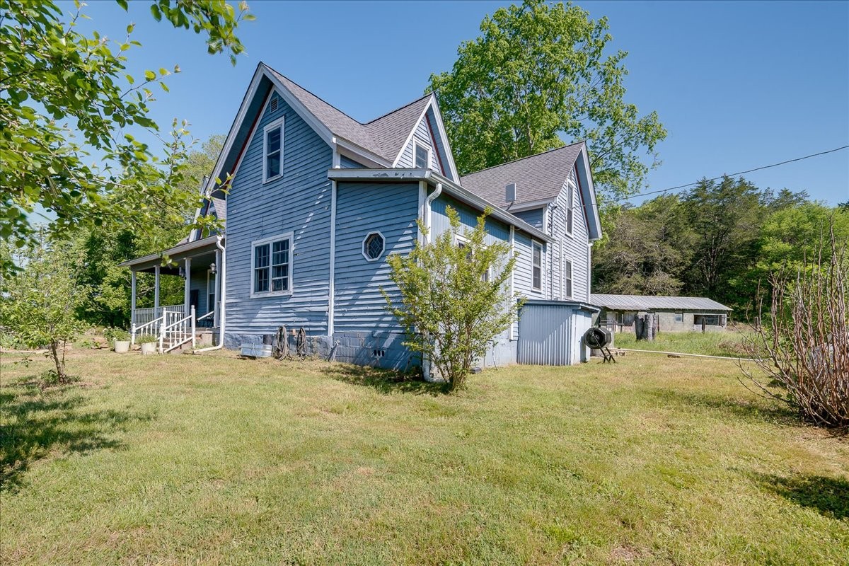 7480 Beech Hill Road Pulaski, TN 38478 - Photo 32 of 54 a view of a house with backyard and sitting area