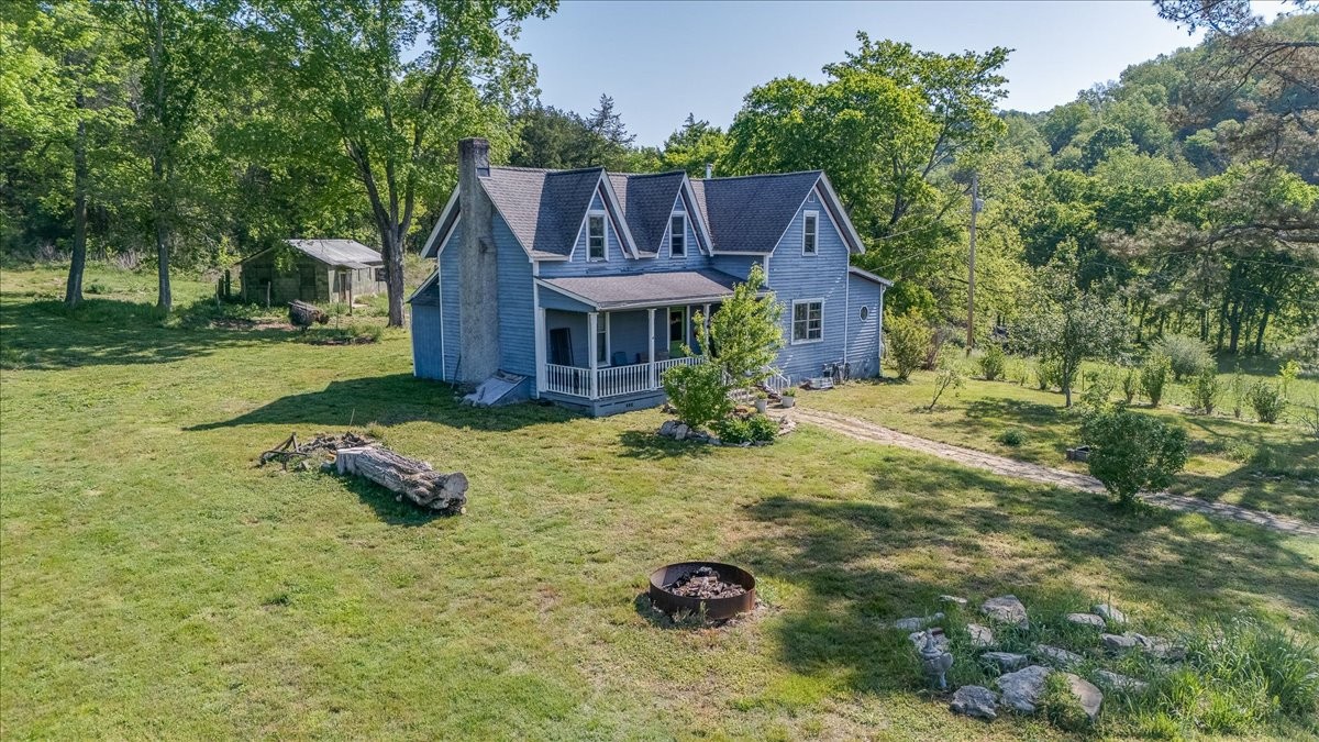 7480 Beech Hill Road Pulaski, TN 38478 - Photo 4 of 54 front view of a house with a yard