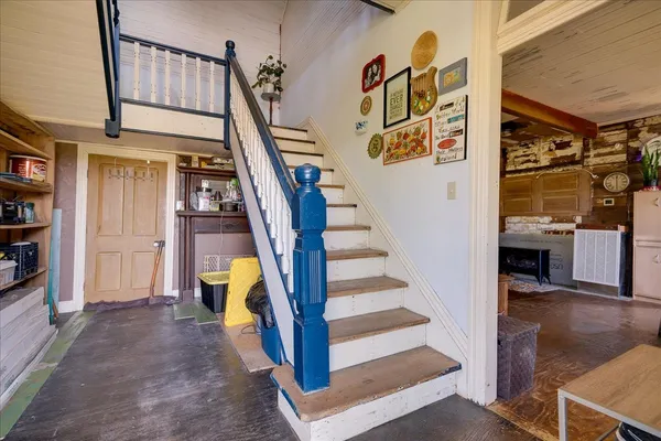 a view of an entryway with a workspace