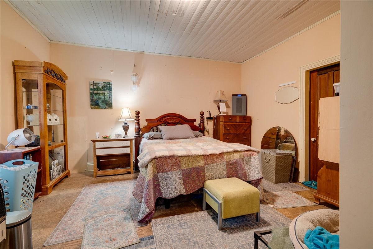 7480 Beech Hill Road Pulaski, TN 38478 - Photo 7 of 54 a bedroom with bed and a window