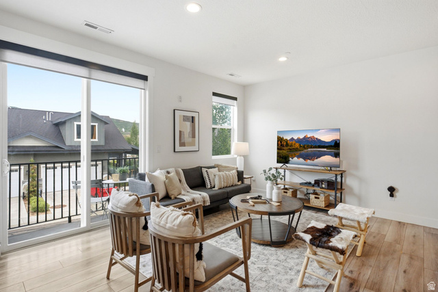 3355 Santa Fe Road Park City, UT 84098 - Photo 10 of 45 Living area with light wood-finish flooring and white walls