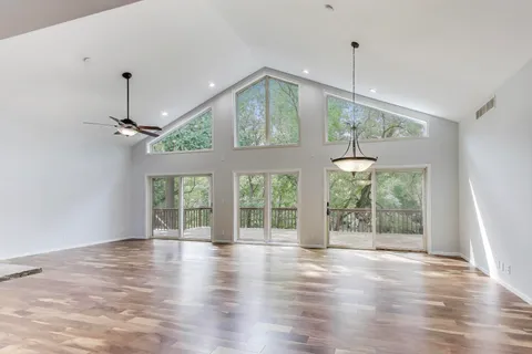 a view of a kitchen with a sink and dishwasher in kitchen