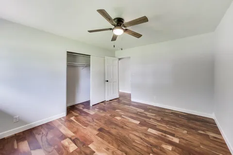 a view of a big room with closet and cabinet