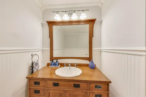 a large kitchen with stainless steel appliances granite countertop a lot of counter space