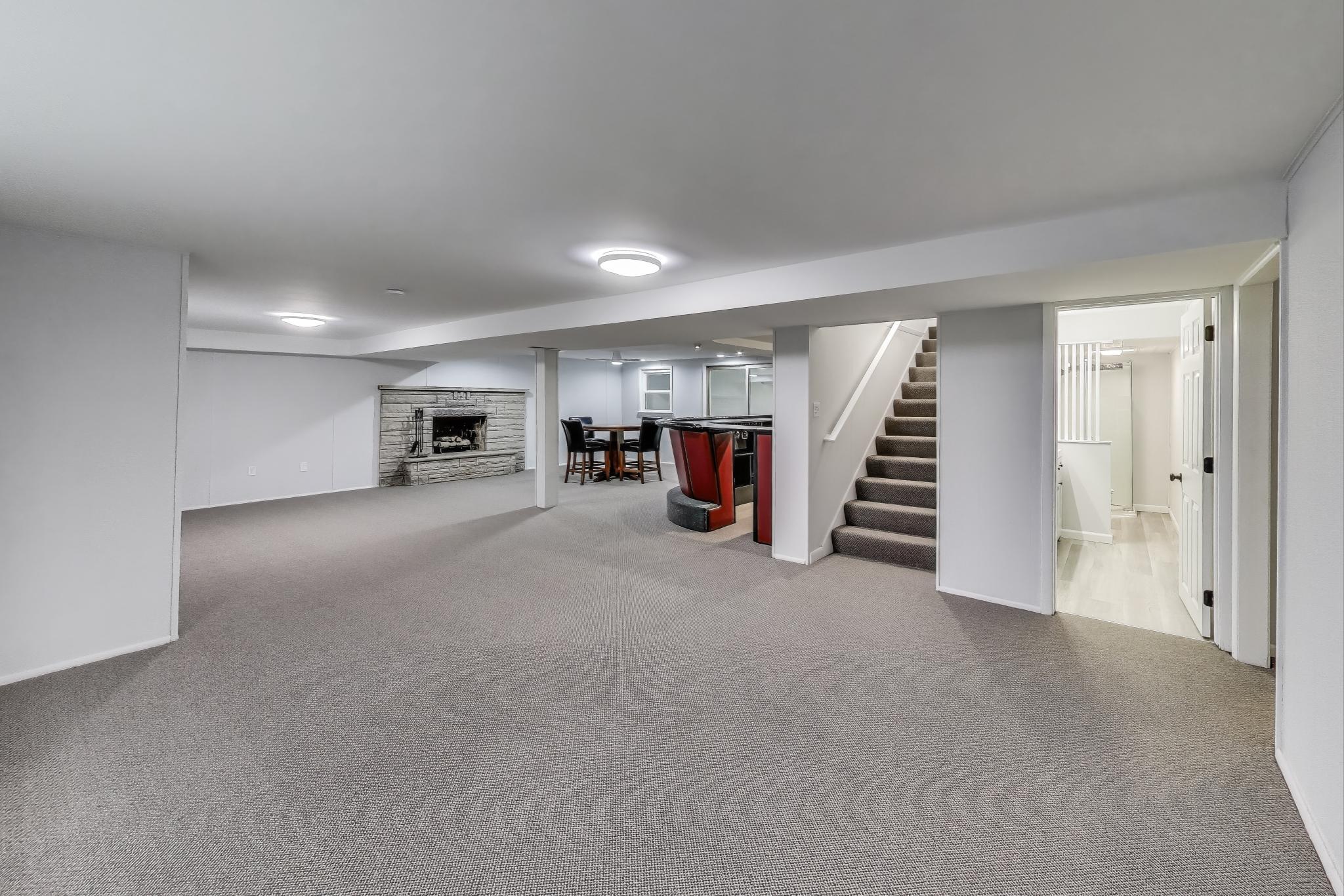 1009 Lake George Drive Hobart, IN 46342 - Photo 39 of 73 a view of an empty room with stairs and a furniture