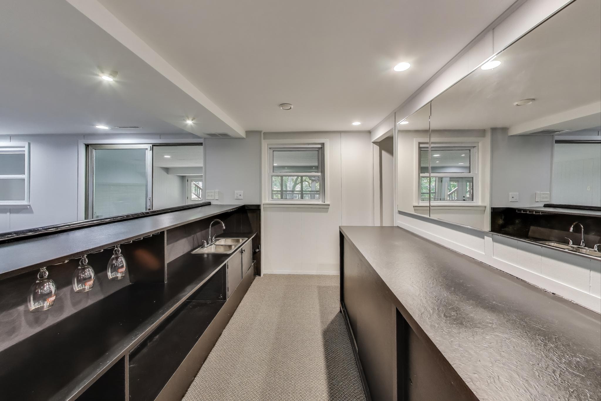 1009 Lake George Drive Hobart, IN 46342 - Photo 45 of 73 a large kitchen with stainless steel appliances granite countertop a lot of counter space