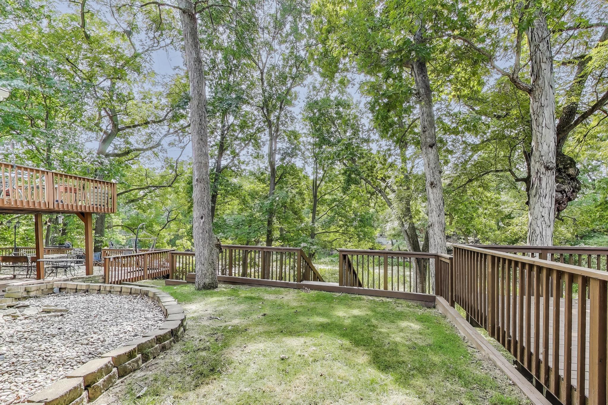 1009 Lake George Drive Hobart, IN 46342 - Photo 64 of 73 a view of backyard with green space and wooden fence