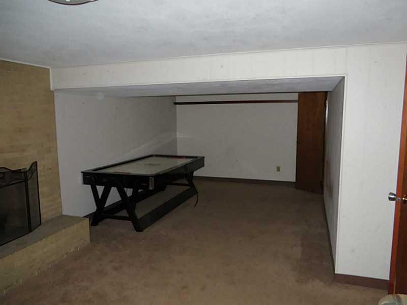 125 Rangley Drive Pittsburgh, PA 15209 - Photo 14 of 24 Great Room. Half bath in corner of gameroom