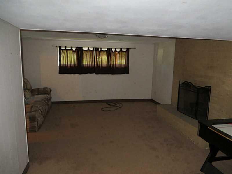 125 Rangley Drive Pittsburgh, PA 15209 - Photo 15 of 24 Great Room. Log burning fireplace in gameroom