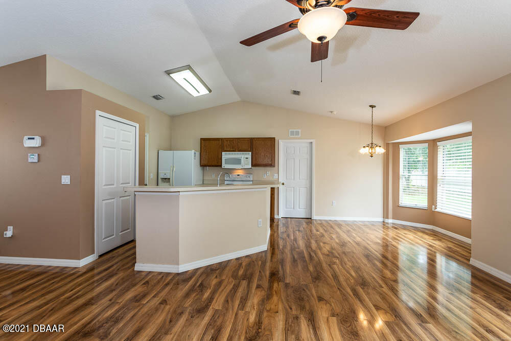 52 Underwick Path Palm Coast, FL 32164 - Photo 5 of 21 a view of kitchen with sink microwave and refrigerator