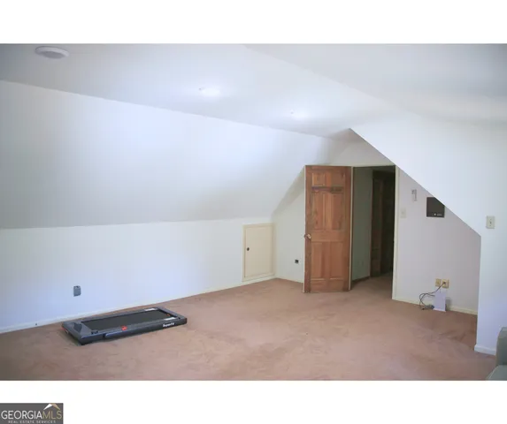 a workspace with furniture and a window