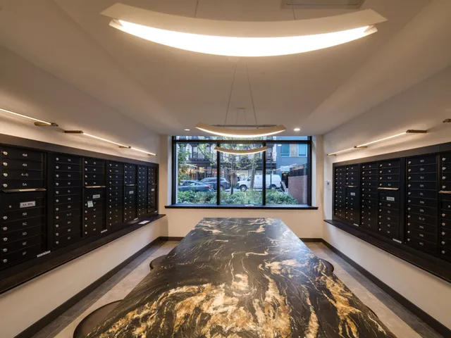 a large room with wooden floor and windows