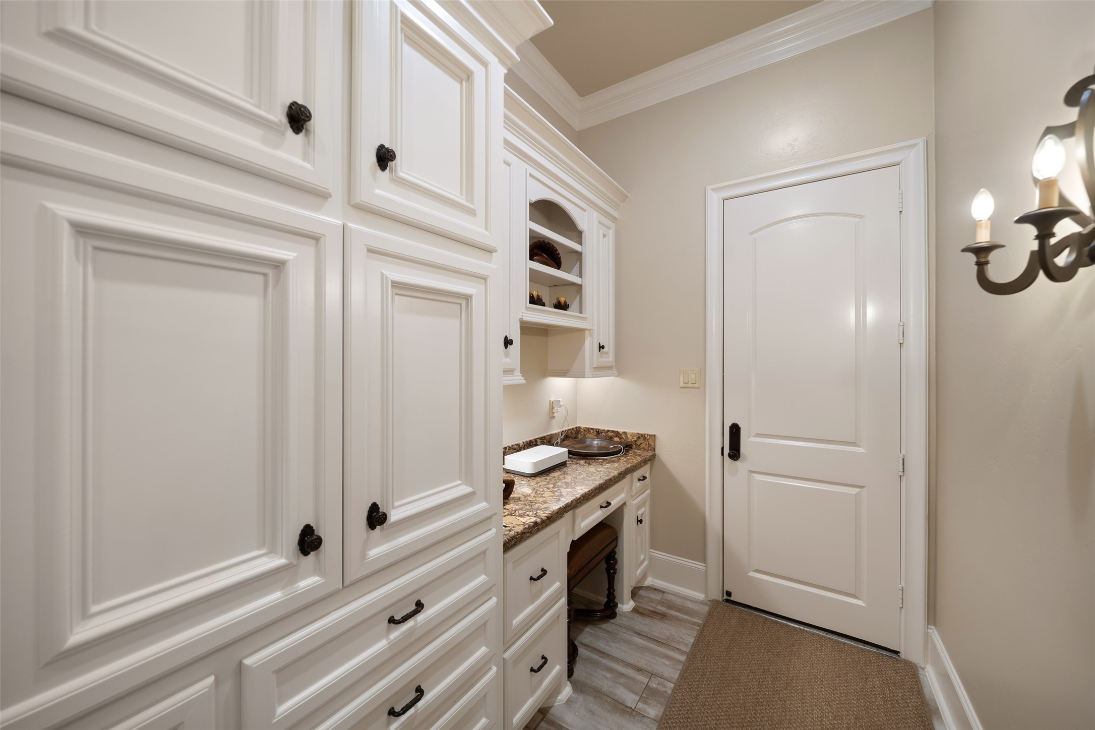 59 East Ambassador Bend Spring, TX 77382 - Photo 14 of 48 Tucked just behind the kitchen, this additional storage and organizational area leads to the oversized one car garage. This garage is temperature controlled with a split unit!