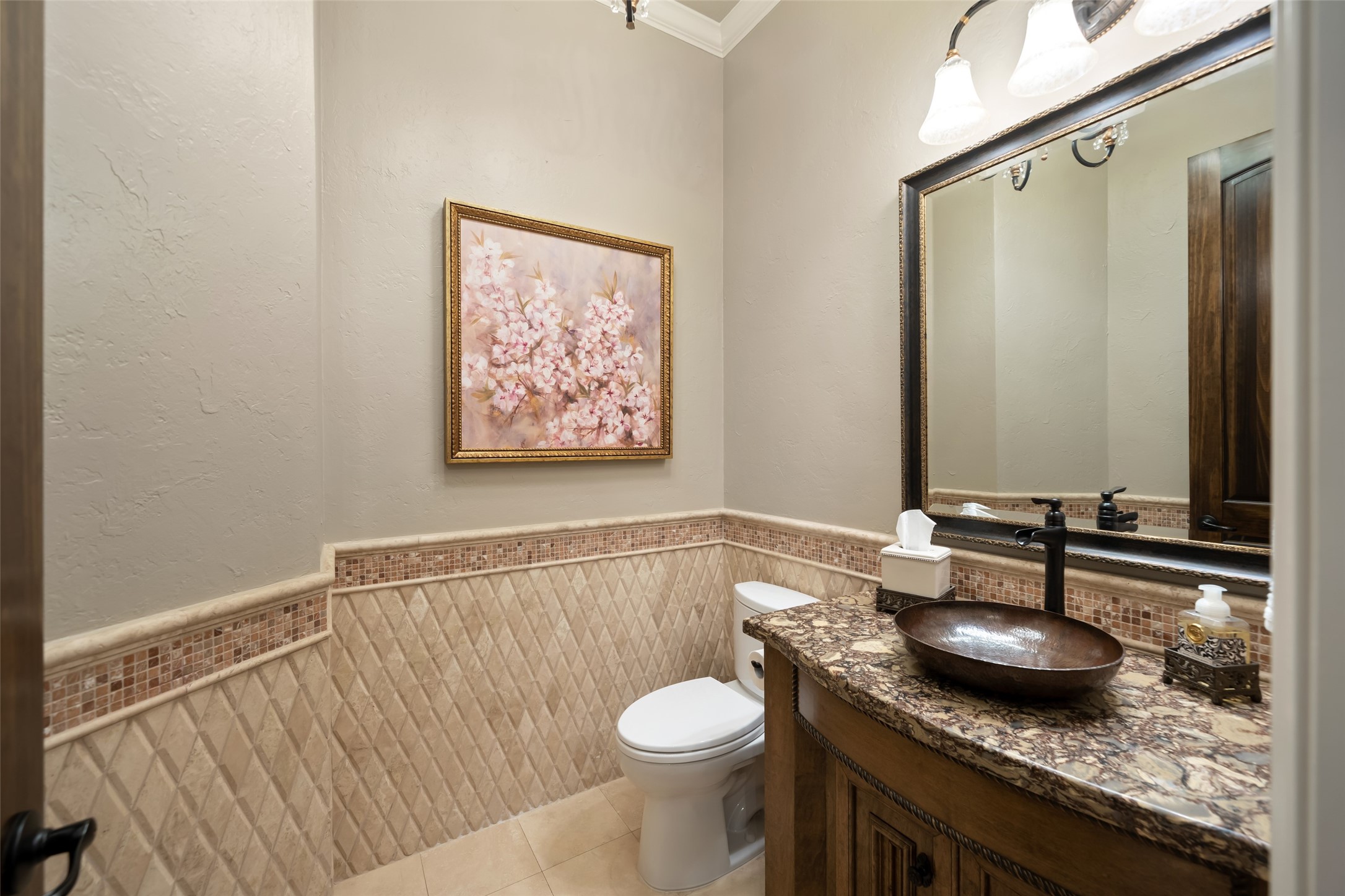 59 East Ambassador Bend Spring, TX 77382 - Photo 20 of 48 The powder bath boasts travertine wainscoting, quartz counters and oil rubbed bronze hardware.