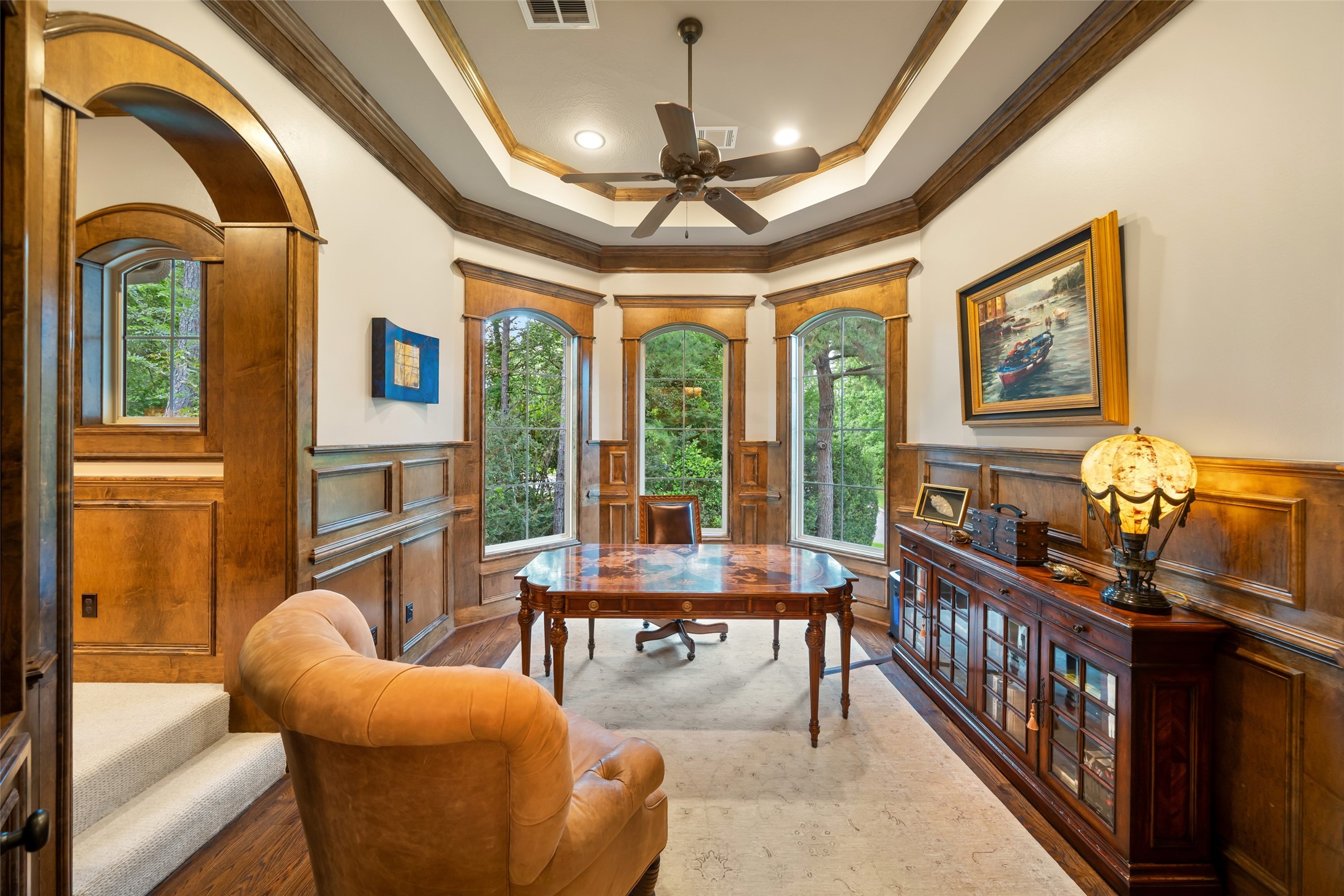 59 East Ambassador Bend Spring, TX 77382 - Photo 23 of 48 The private study is generously sized, featuring wood floors and large encased windows providing abundant natural light and a beautiful view.