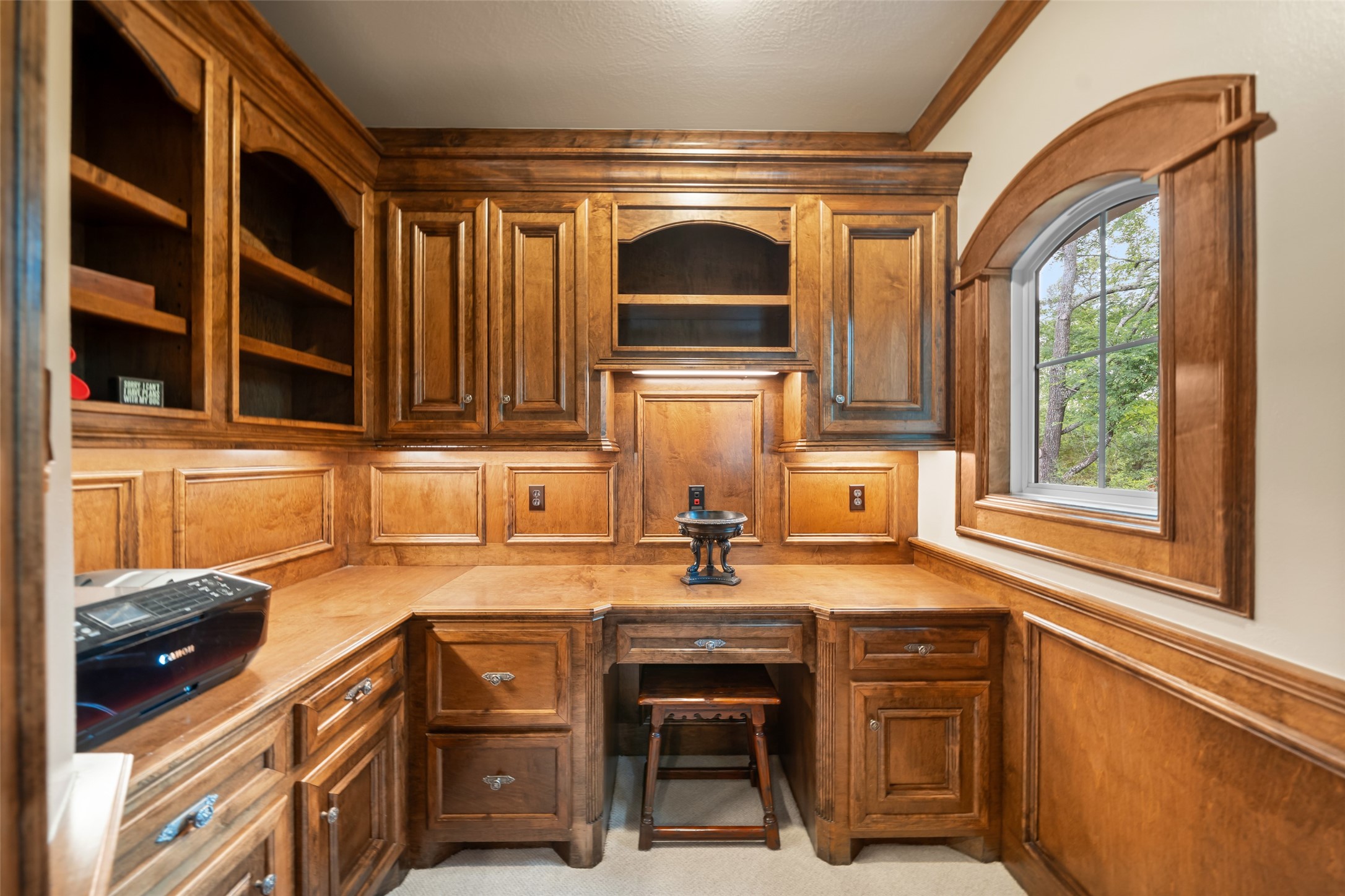 59 East Ambassador Bend Spring, TX 77382 - Photo 24 of 48 Discreetly tucked away off the study is this functional workspace with stunning millwork that offers ample storage and functionality!