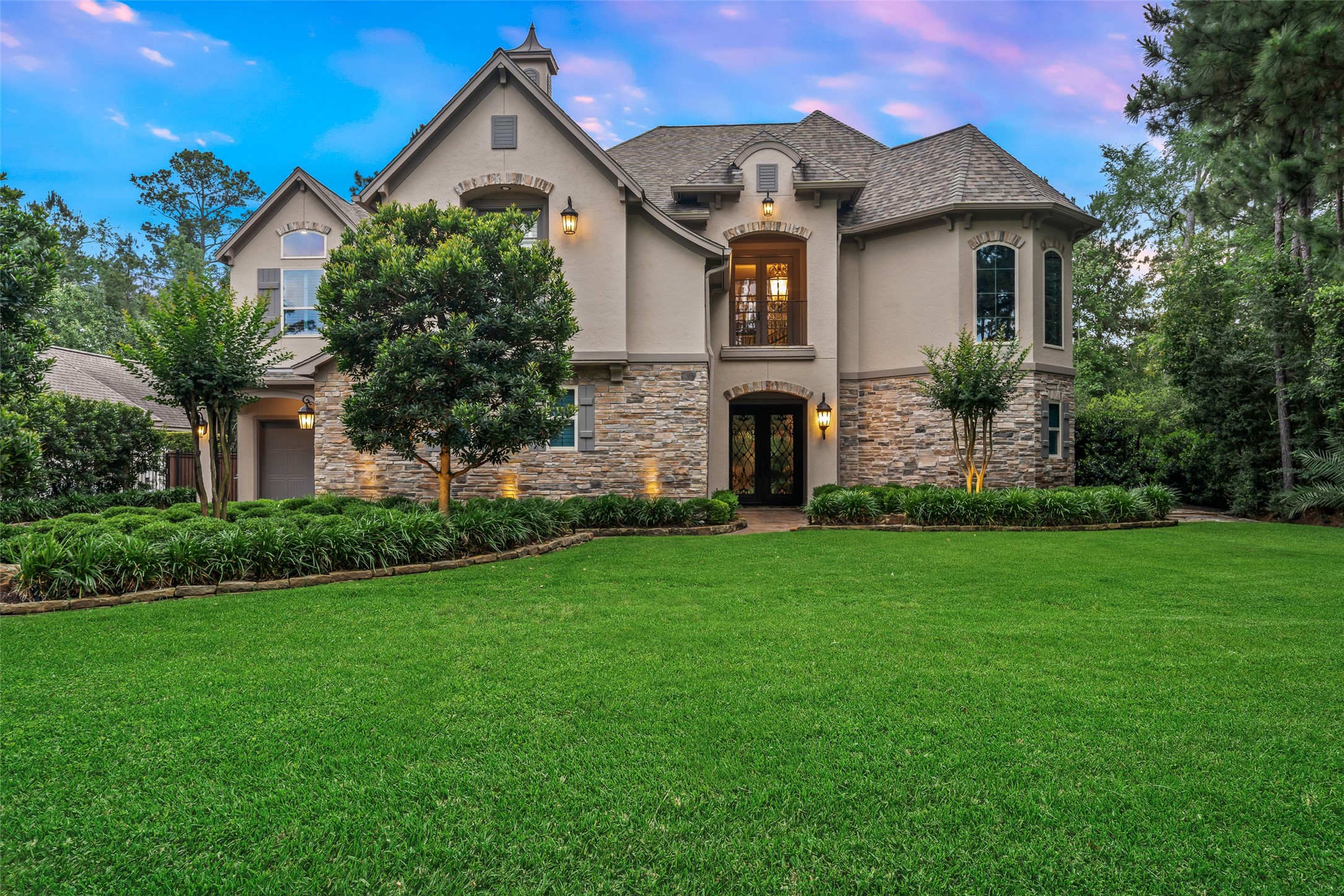 59 East Ambassador Bend Spring, TX 77382 - Photo 45 of 48 Even more breathtaking as the sun begins to set, this home radiates beauty in the evening light! Don't miss this one!
