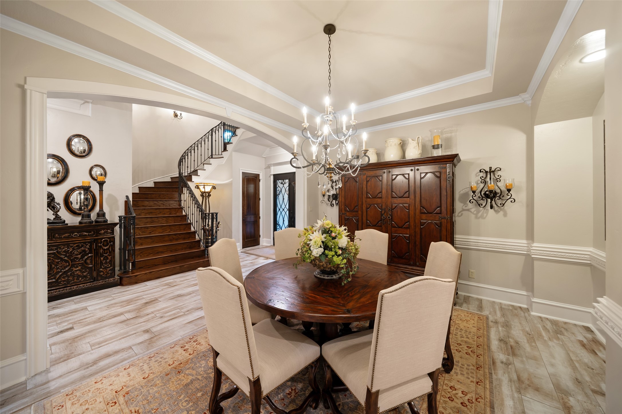 59 East Ambassador Bend Spring, TX 77382 - Photo 4 of 48 The formal dining room impresses with its tray ceiling and double crown molding. This room is the perfect setting for hosting intimate dinners.
