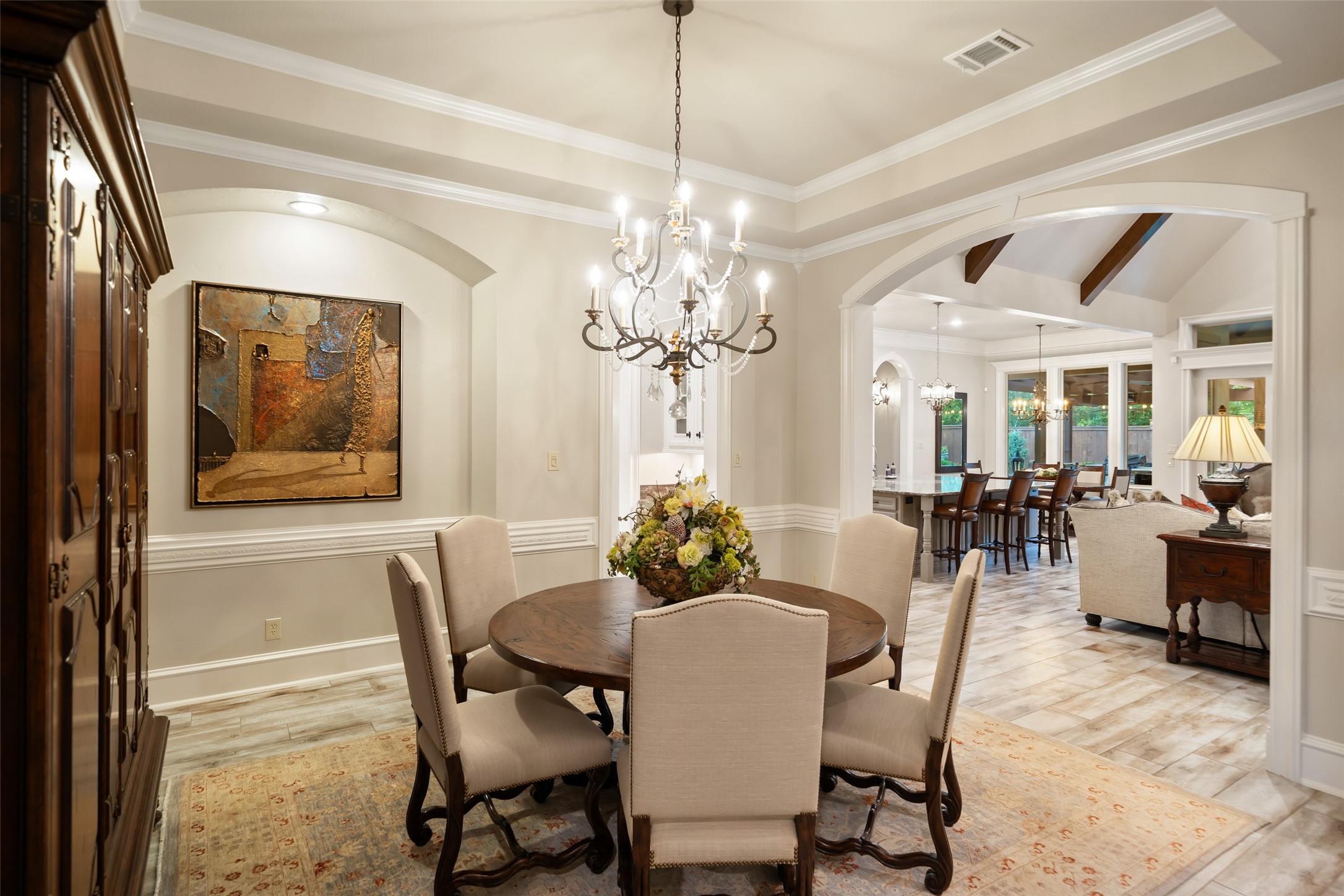 59 East Ambassador Bend Spring, TX 77382 - Photo 5 of 48 This view of the dining room highlights the home’s classic architectural details and timeless design. Elegant finishes and refined lines come together to create a sophisticated space. The seamless flow and attention to detail make this dining room as functional as it is visually striking.