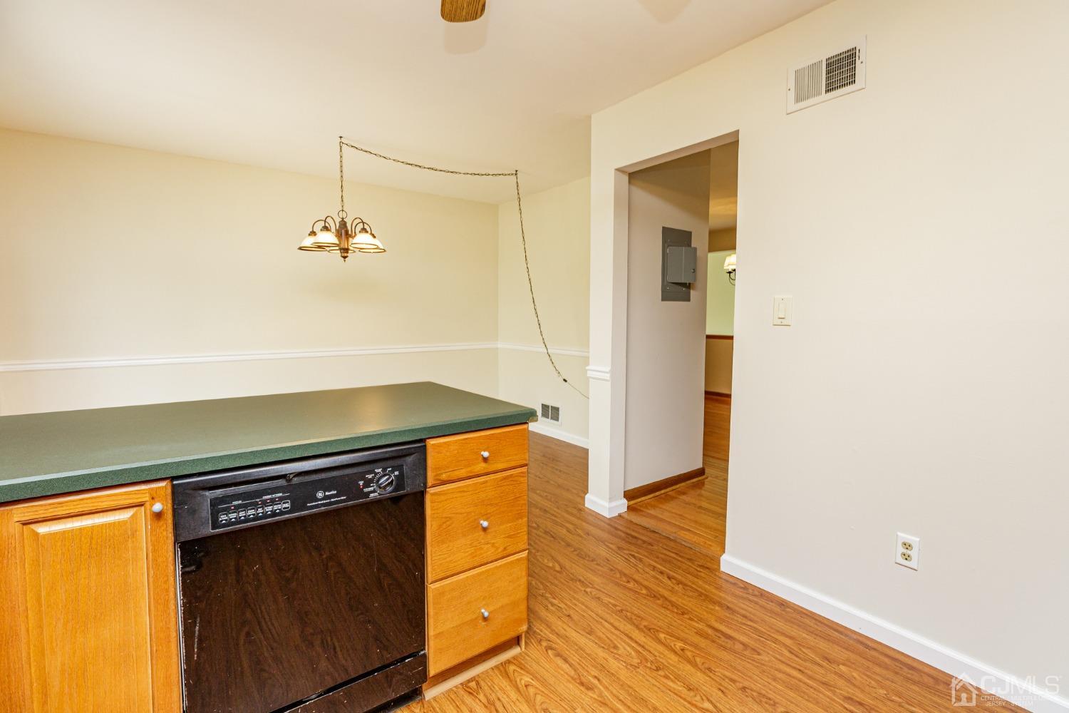 335 Alpine Court, Unit 35 Stanhope, NJ 07874 - Photo 17 of 32 a kitchen with a stove and a refrigerator