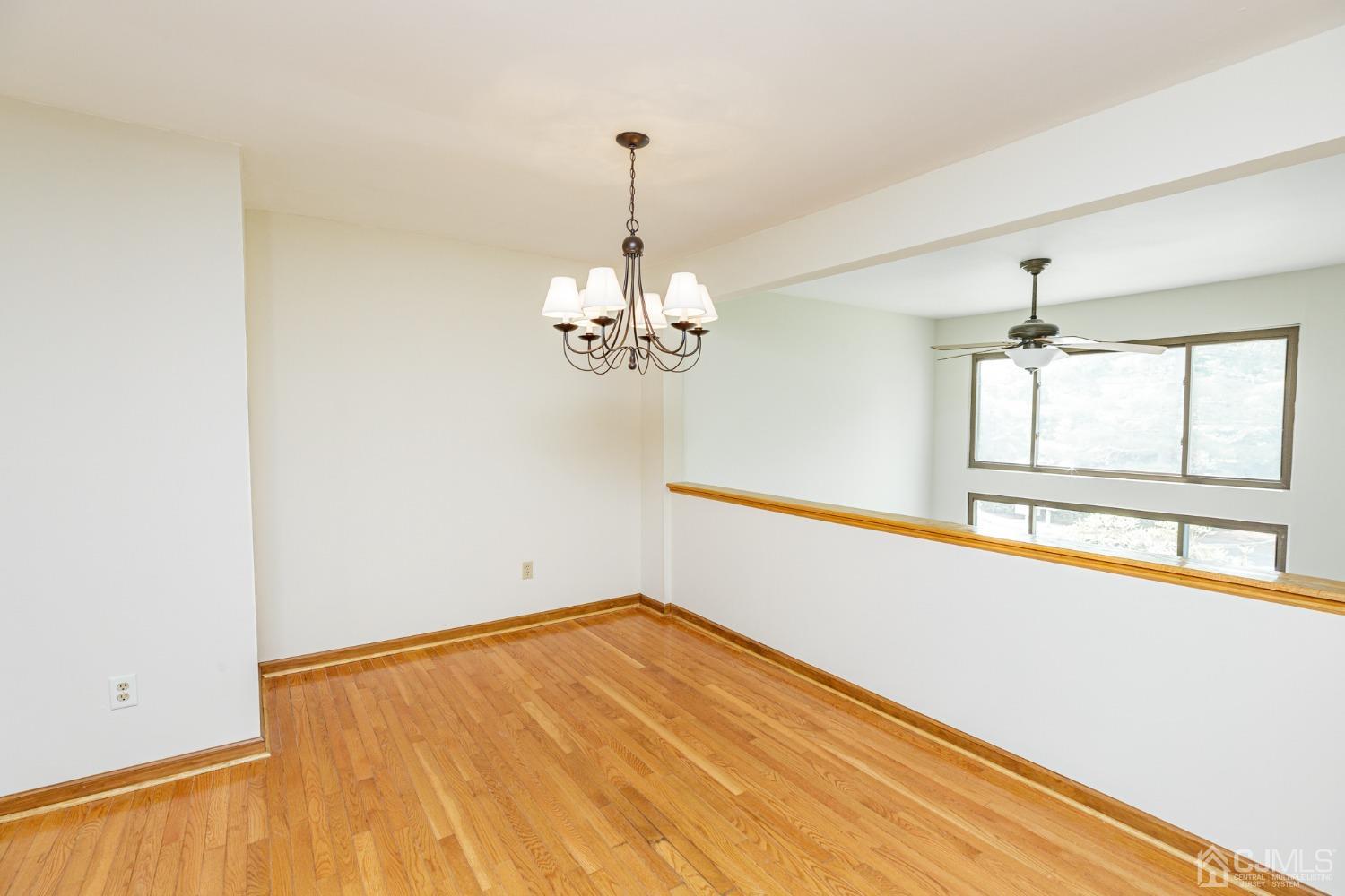 335 Alpine Court, Unit 35 Stanhope, NJ 07874 - Photo 8 of 32 a view of empty room with window