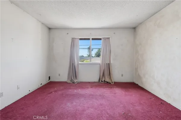 an empty room with window