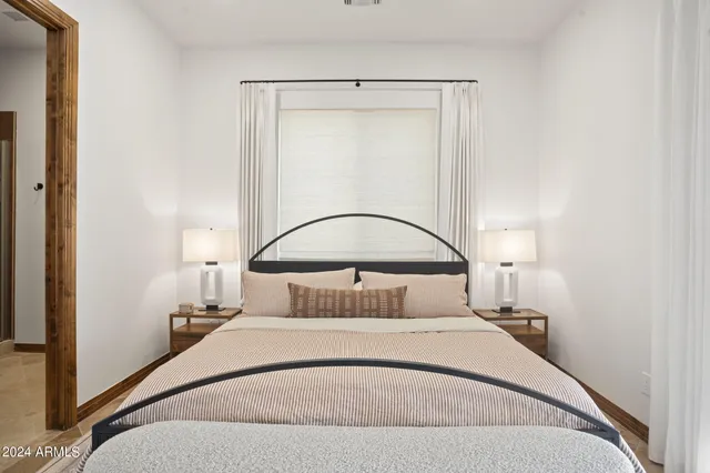 a view of a house with swimming pool and sitting area