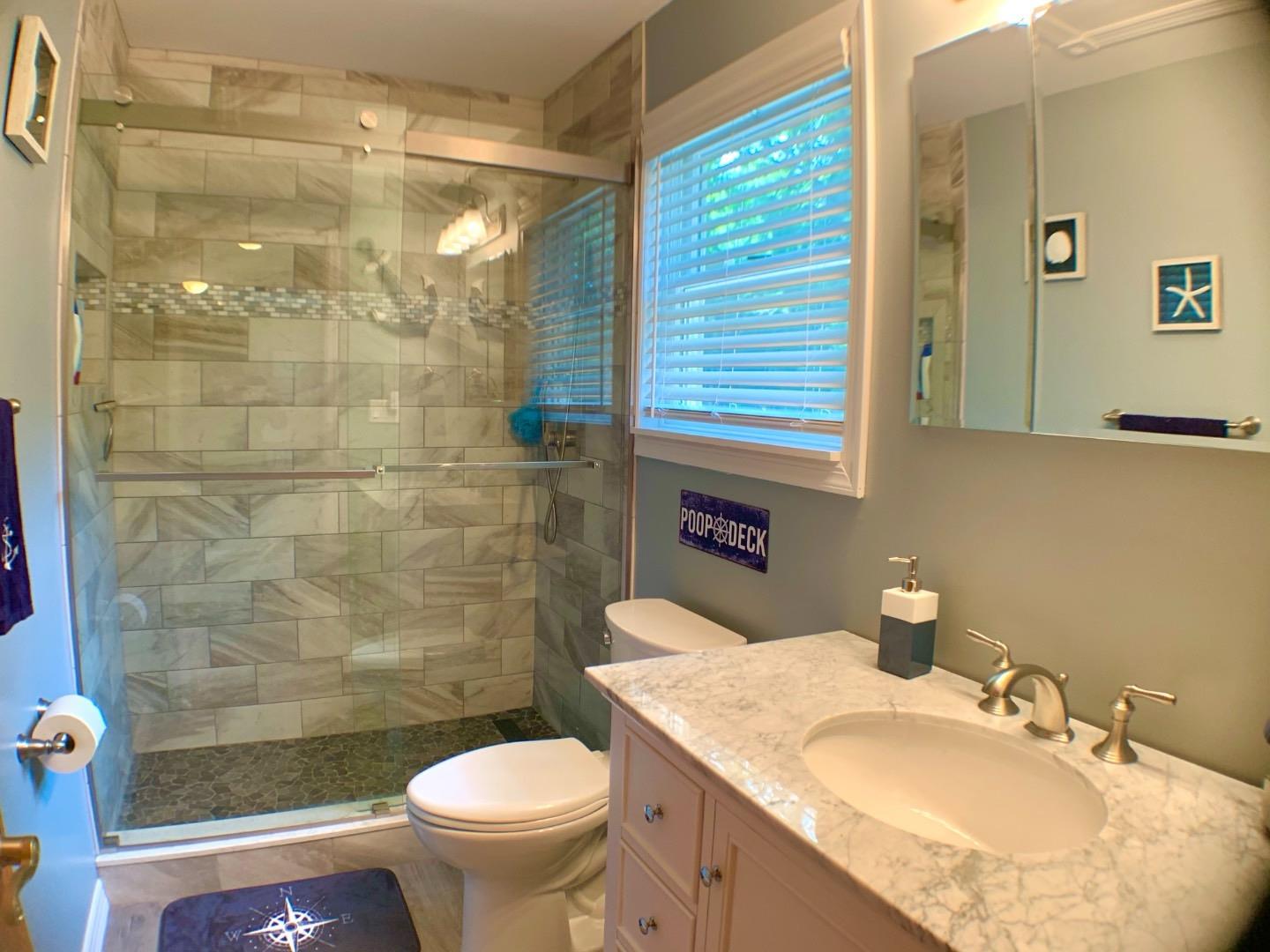 5 Spruce Street East Hampton, NY 11937 - Photo 15 of 16 Full bath with a shower stall, toilet, and vanity