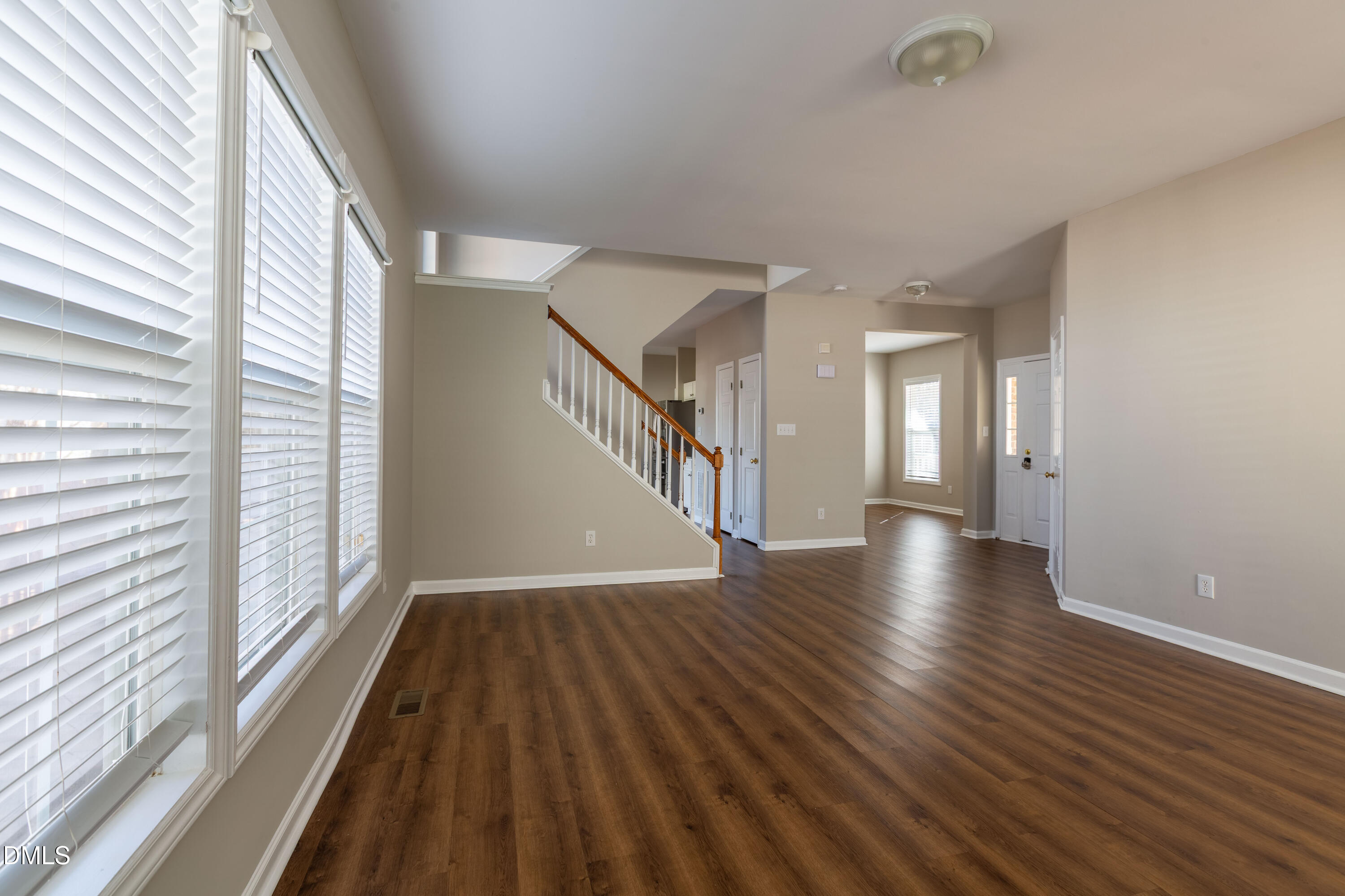 2339 School Creek Place Raleigh, NC 27606 - Photo 11 of 59 a view of entryway with wooden floor