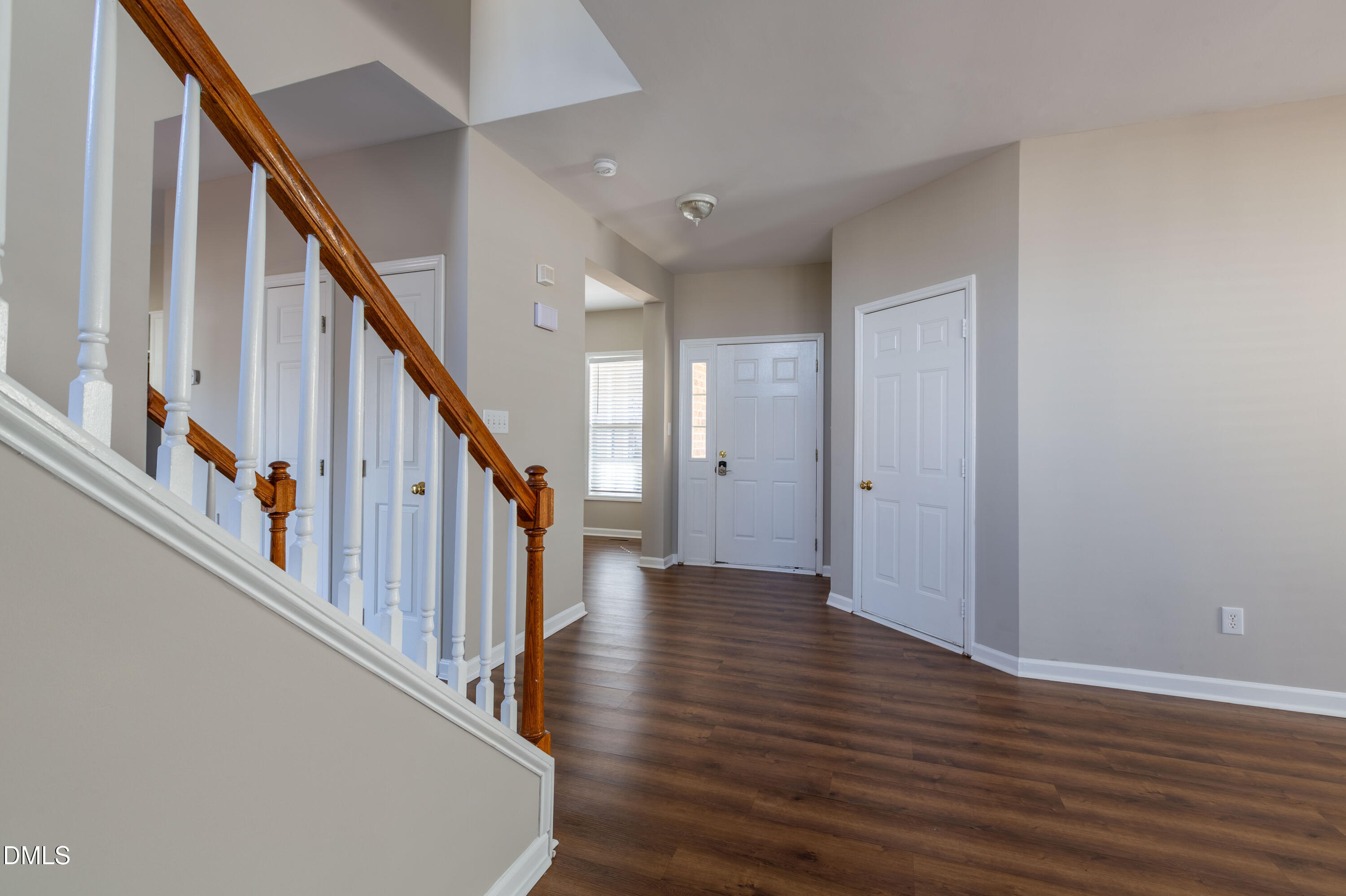 2339 School Creek Place Raleigh, NC 27606 - Photo 12 of 59 a view of an entryway with wooden floor