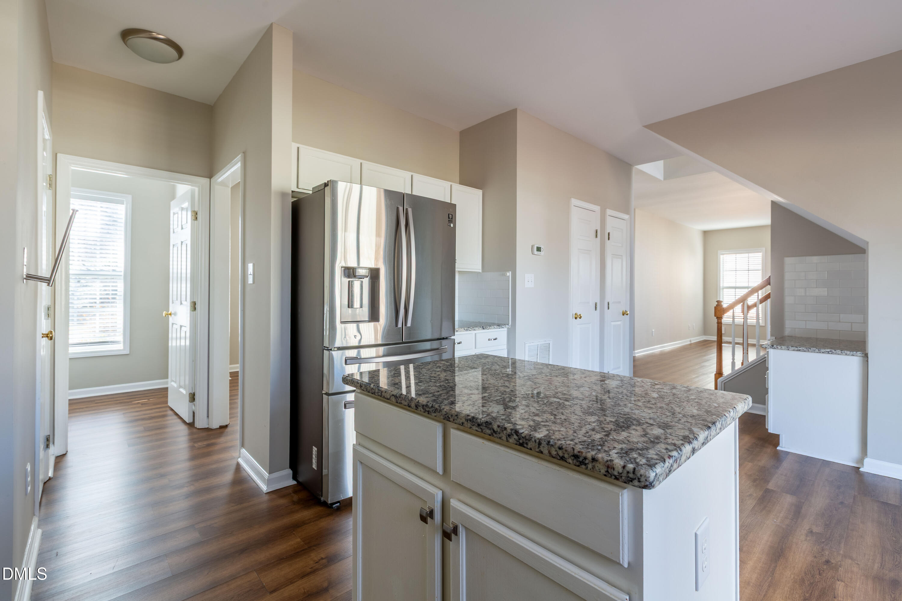 2339 School Creek Place Raleigh, NC 27606 - Photo 18 of 59 a kitchen with stainless steel appliances granite countertop a refrigerator and a sink