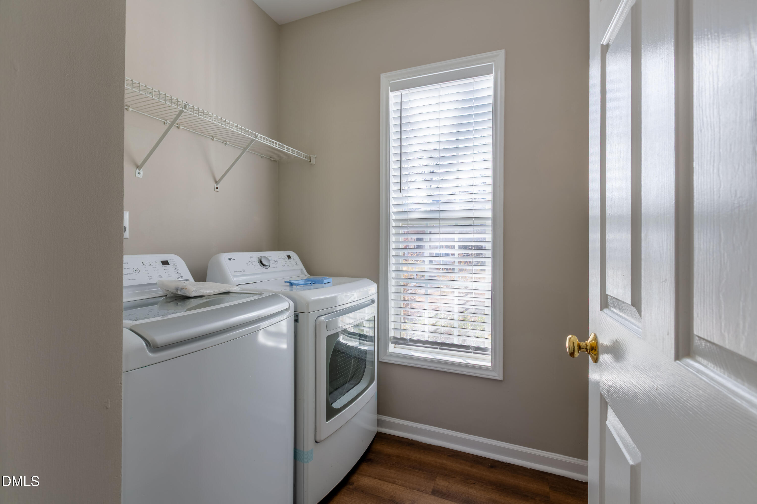 2339 School Creek Place Raleigh, NC 27606 - Photo 20 of 59 a utility room with dryer and washer