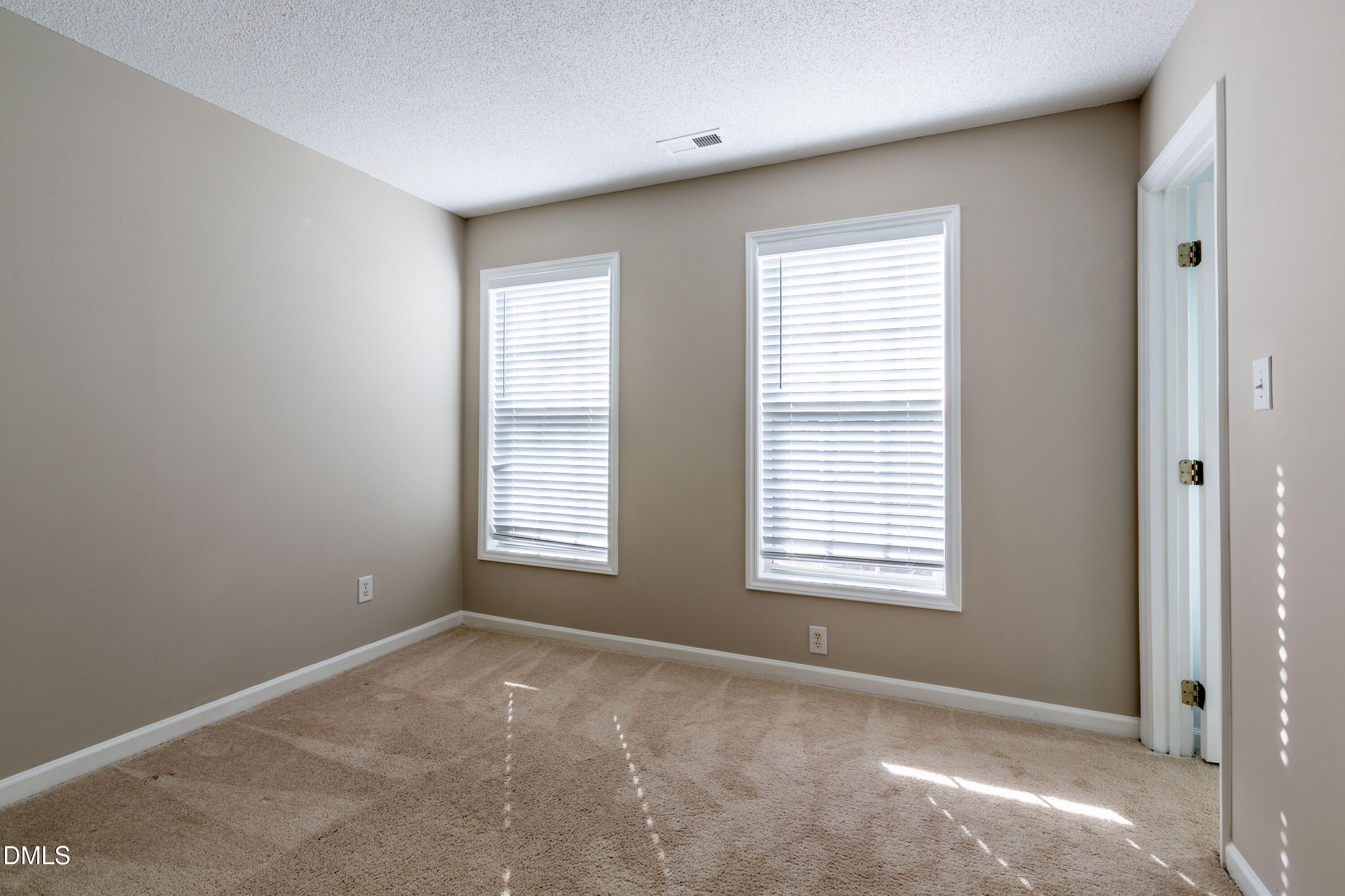 2339 School Creek Place Raleigh, NC 27606 - Photo 30 of 59 a view of an empty room with a window